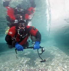 Ice diver at the shallow entry point in Morrisons Quarry.... by Michael Grebler 